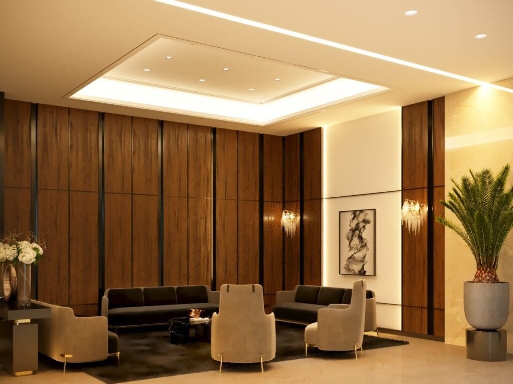 منطقة استقبال فاخرة في قاعة كبار الزوار، تبرز دقة التشطيب في أعمال الديكور والأثاث المدمج